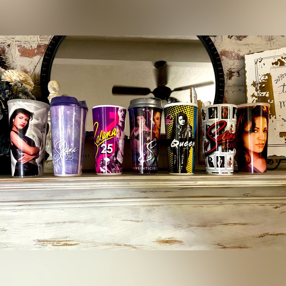 Set of 7 Selena cups -  all cups include lids and are in excellent condition.